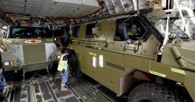 Converted Bushmaster protected mobility vehicles bound for Ukraine are loaded onto a C-17A Globemaster III aircraft at RAAF Base Amberley, Queensland. Story by Captain Mike Edwards. Photo by Leading Aircraftwoman Kate Czerny.
