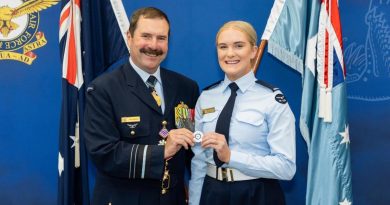 Former chief of Air Force, Air Marshal (retd) Gavin ‘Leo’ Davies, with Aircraftwoman Brooklynn Dowling after her graduation from recruit training, holding the challenge coin the former chief had given to her five years ago. Story by Squadron Leader Matthew Kelly. Photo from Cut Above Productions.