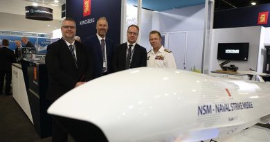 Chief of Navy Vice Admiral Michael Noonan meets with representatives from Kongsberg Defence and Aerospace at the Indo Pacific 2022 conference in Sydney. Photo by Leading Seaman James McDougall.