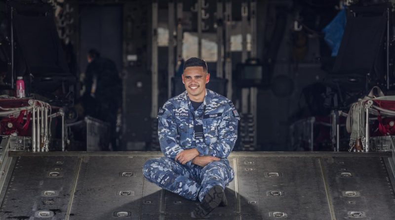 Flight Lieutenant Tjapukai Shaw on the cargo ramp of a C-130J Hercules aircraft. Story by Flight Lieutenant Jessica Aldred. Photo by Sergeant Christopher Dickson.