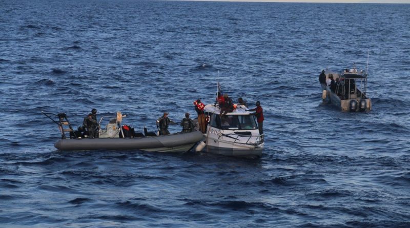 Royal Australian Navy personnel transfer passengers from a stricken Royal Solomon Islands Police Force vessel to HMAS Ararat on May 21. Story by Captain Lily Charles.