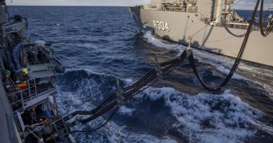 A fuel line is padded from HMAS Stalwart, right, to HMAS Parramatta during Stalwart's first replenishment at sea. Story by Lieutenant Gary McHugh. Photo by Leading Seaman Leo Baumgartner.