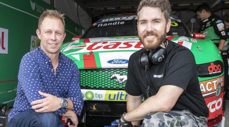 Chief of Navy Vice Admiral Michael Noonan, left, with Leading Seaman Jacob Marsden in the pits of the Tickford Racing Supercars team during this year's Formula 1 Australian Grand Prix in Melbourne. Story by Lieutenant Ben Willee. Photo by Leading Seaman James McDougall.