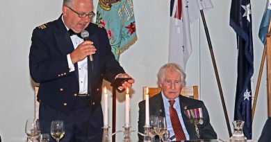 Squadron Leader Michael Veitch and President of the No. 30 Squadron RAAF Beaufighter Association Bruce Robertson at the No. 30 Squadron anniversary dinner. Story by By Flight Lieutenant Dee Irwin. Photo by Petty Officer Rick Prideaux.