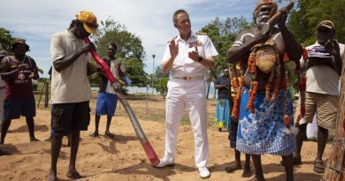 Mr Djambawa Marawili conducts a welcome ceremony for Chief of Navy Vice Admiral Michael Noonan, accompanied by Mudiny Mudiny Dhamarrandji playing the didgeridoo. Story by Lieutenant Commander Tanalee Smith. Photo by Petty Officer Bradley Darvill.