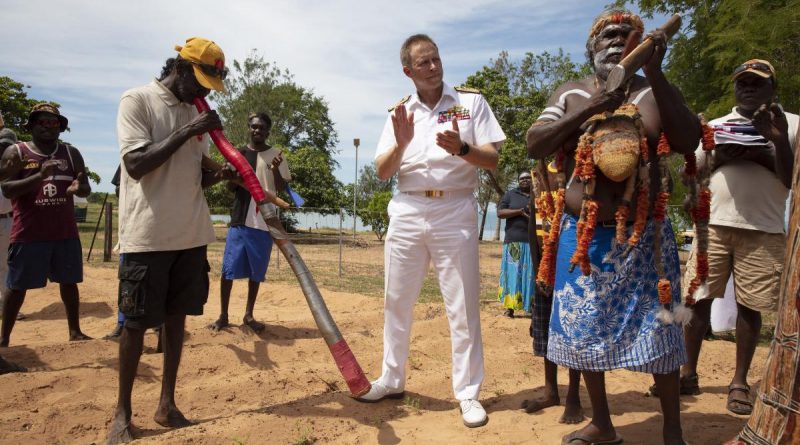 Mr Djambawa Marawili conducts a welcome ceremony for Chief of Navy Vice Admiral Michael Noonan, accompanied by Mudiny Mudiny Dhamarrandji playing the didgeridoo. Story by Lieutenant Commander Tanalee Smith. Photo by Petty Officer Bradley Darvill.