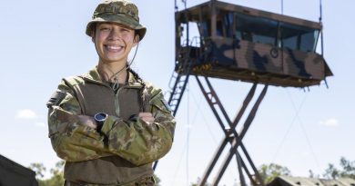 Royal Australian Air Force Flight Lieutenant Janet Mulder from No. 452 Squadron Amberley Flight, in front of the Air Traffic Control Tower, during Exercise Vigilant Scimitar at Charters Towers Airport, Queensland. Story by Captain Carolyn Barnett. Photo by Corporal Jarrod McAneney.