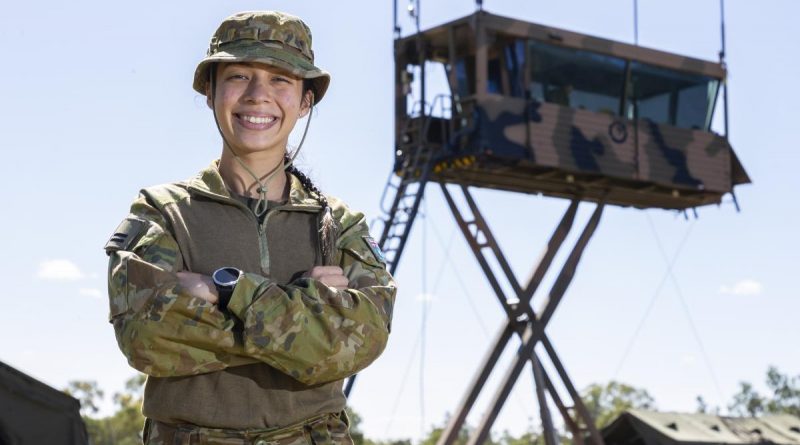 Royal Australian Air Force Flight Lieutenant Janet Mulder from No. 452 Squadron Amberley Flight, in front of the Air Traffic Control Tower, during Exercise Vigilant Scimitar at Charters Towers Airport, Queensland. Story by Captain Carolyn Barnett. Photo by Corporal Jarrod McAneney.