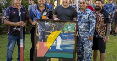 Mr Les Huddlestone, left, Mr James Parfitt from Larrakia Nation, Wing Commander Jim Collisson, Flight Lieutenant Norm Grogan and Mr Trent Lee from Larrakia Nation. Story by Flight Lieutenant Claire Burnet. Photo by Sergeant Pete Gammie.