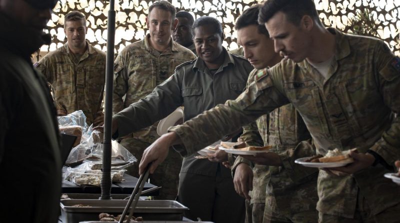 Soldiers from the Republic of Fiji Military Forces share a traditional Fijian Lovo with Australian Army soldiers from 8/9 RAR during the closing ceremony of Exercise Coral Soldier at Gallipoli Barracks, Brisbane. Story by Captain Taylor Lynch. Photo by Corporal Nicole Dorrett.