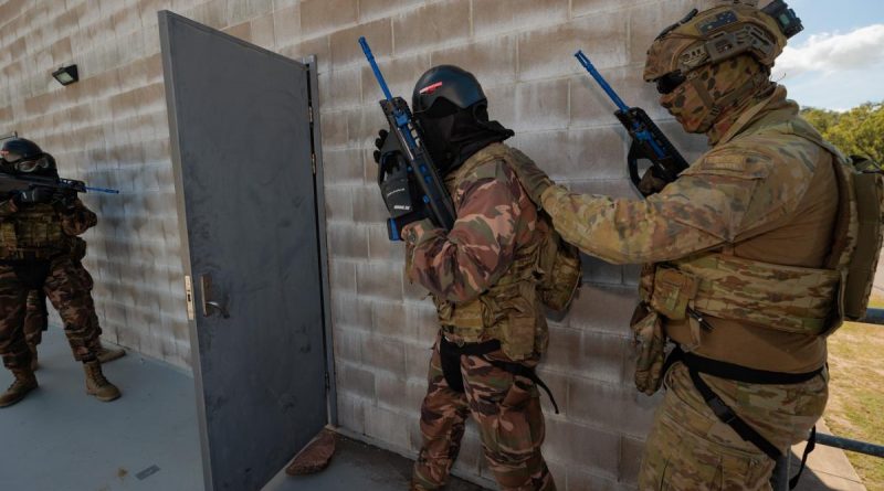 Australian Army soldiers from 1 RAR train with Royal Tongan Marines on urban clearance drills at Lavarack Barracks. Story by Captain Diana Jennings. Photo by Sergeant Andrew Sleeman.