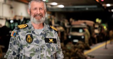 Captain Jim Hutton on the light vehicle deck of HMAS Adelaide during Exercise Sea Explorer. Story by Captain Joanne Leca. Photo by Corporal Robert Whitmore.