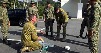 WO2 Cameron Elliott provides training to a Malaysian explosives detection dog section during Exercise Anjing Perang in 2017. Story by Warrant Officer Class Two Max Bree.