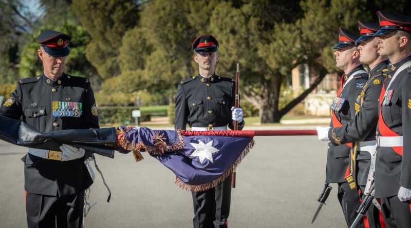 The Queen's Colour is uncased for the Trooping of the Queen's Colour at the Royal Military College - Duntroon, Canberra. Story by Captain Dean Benson. Photo by Corporal Madhur Chitnis.