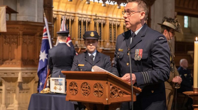 Royal Australian Air Force Officer Wing Commander Andrew Harrigan speaks to guests during the Sir Ross Smith commemorative service held at St Peter's Cathedral in Adelaide. Photo by Sergeant Murray Staff.