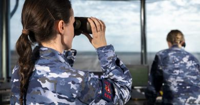 Royal Australian Air Force Air Traffic Controller, Flying Officer Charlotte Walsh (left) from No. 452 Squadron, spots an incoming aircraft at RAAF Base Tindal in the Northern Territory, during Exercise Diamond Storm 2022. Story by Flight Lieutenant Robert Hodgson.