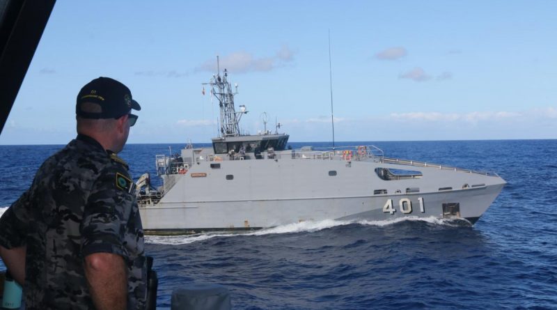 Commanding Officer HMAS Ararat Lieutenant Commander David Martinussen watches RFNS Savenaca complete a replenishment-at-sea approach during a combined patrol on Operation Solania 2022.