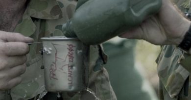 Private Adrian Crutchley and Corporal Hawkins, 7 Section, 6 Platoon, 6RAR, within canteen 'fragged' in a grenade attack on their position in East Timor, July 2000. Photo by Corporal Kevin Piggott.