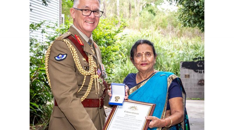 Chief of Army Lieutenant General Rick Burr, with 1st Division's Dr Madhu Patel, celebrating her 50 years of service in the Australian Army at Gallipoli Barracks in Brisbane, Queensland. Story by Captain Jessica O’Reilly. Photo by Corporal Miguel Anonuevo.