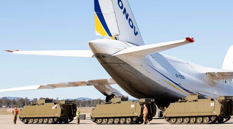 M113AS4 armoured personnel carriers bound for Ukraine wait to be loaded onto an Antonov An-124 cargo plane at RAAF Base Amberley, Queensland. Photo by Leading Aircraftwoman Emma Schwenke.