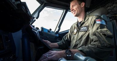 Pilot Flight Lieutenant Angus Wheeler, from No. 292 Squadron, plans the departure and arrival for an upcoming mission in the flight deck of a P-8A Poseidon aircraft at RAAF Base Edinburgh. Story by Corporal Veronica O'Hara. Photo by Leading Aircraftman Sam Price.