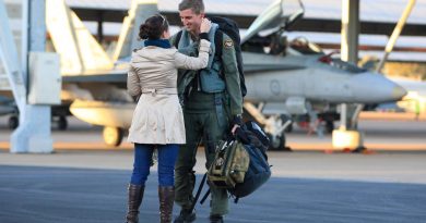 Wing Commander Martin Parker is greeted by his wife Chantelle on returning from the final mission of his fighter combat instructor course in 2011. Story by Warrant Officer Class 2 Max Bree. Photo by Leading Aircraftman Mark Friend.