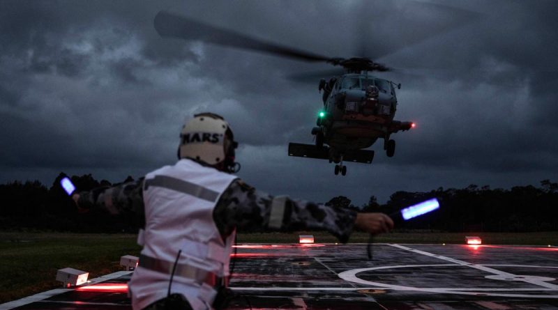 A Navy MH-60R Seahawk helicopter, such as this one, was involved in the rescue of three residents from Kangaroo Valley who were trapped by flood waters.