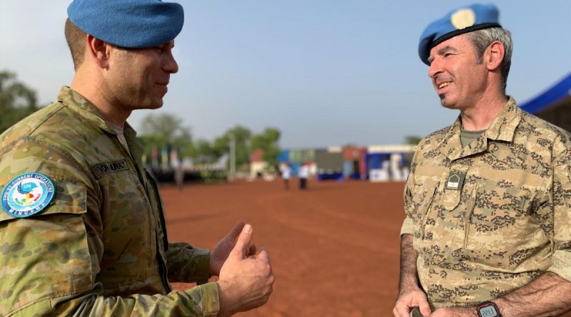 Australian Army officer Major Nathanael von Muralt (left) who is serving with the UN Multidimensional Integrated Stabilisation Mission in Mali (MINUSMA). Peacekeepers from 61 countries are represented in MINUSMA. Story by Sergeant Matthew Bickerton. Photo by Able Seaman Susan Mossup.