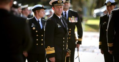 Chief of Navy Vice Admiral Michael Noonan inspects the guard during the commissioning ceremony for HMAS Encounter at Torrens Parade Ground, Adelaide, South Australia. Photo by Able Seaman Susan Mossop.