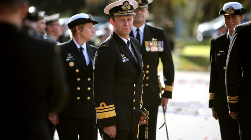 Chief of Navy Vice Admiral Michael Noonan inspects the guard during the commissioning ceremony for HMAS Encounter at Torrens Parade Ground, Adelaide, South Australia. Photo by Able Seaman Susan Mossop.