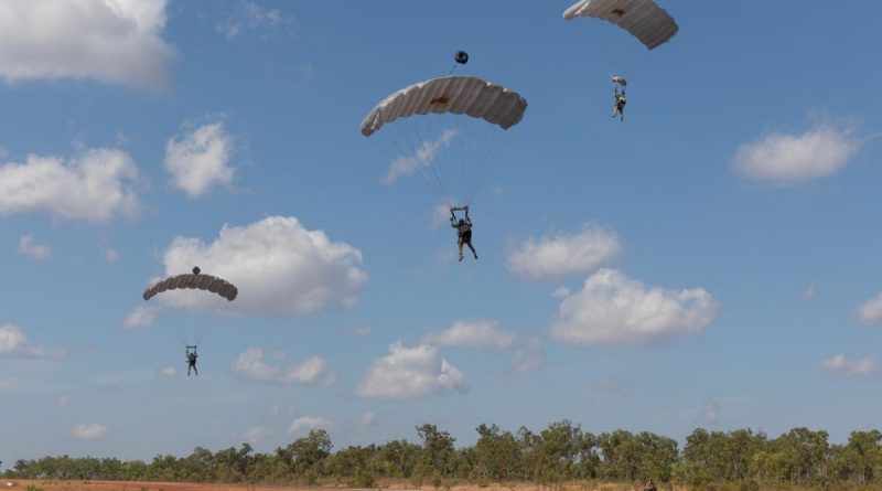 Combat controllers from No. 4 Squadron parachute into Mount Bundey training area in the Northern Territory during Exercise Diamond Storm. Story by Flying Officer Connor Bellhouse. Photo by Leading Aircraftman Sam Price.