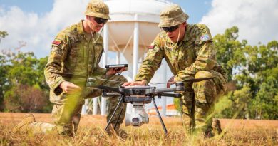 Air Force Security Aircraftman Joshua Church, left, and Airfield Defence Guard Leading Aircraftman David Wilson conduct a post-flight inspection of the R70 Sky Ranger unmanned aerial system. Story by Flight Lieutenant Katrina Thomasson. Photo by Leading Aircraftman Sam Price.