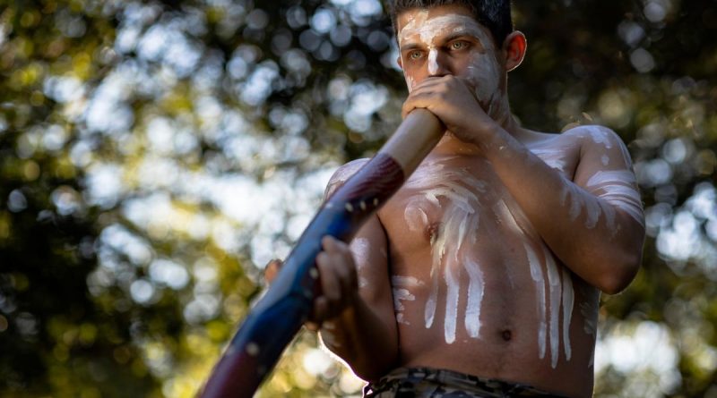 Royal Australian Navy's inaugural Indigenous cultural performer, Able Seaman Aviation Support Lynton Robbins plays the yidaki/didgeridoo at Garden Island Defence Precinct, Sydney. Photo by Able Seaman Susan Mossop.