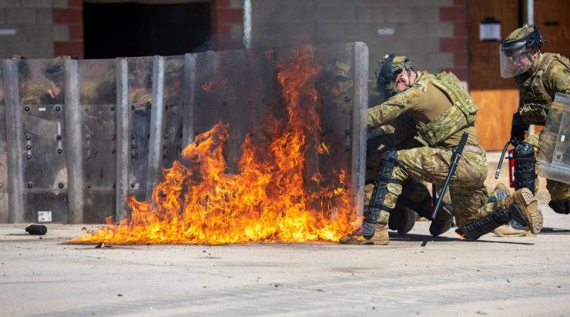 Australian Army soldiers from the 3rd Battalion, Royal Australian Regiment and 1st Military Police Battalion participate in a population protection control course at Townsville Field Training Area, Queensland. Story by Captain Diana Jennings. Photo by Corporal Daniel Sallai.