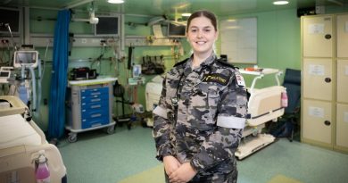 Seaman Medic Laine McLatchey stands in the sick bay onboard HMAS Canberra while at sea during Exercise Rim of the Pacific 2022. Story and photo by Leading Seaman Matthew Lyall.