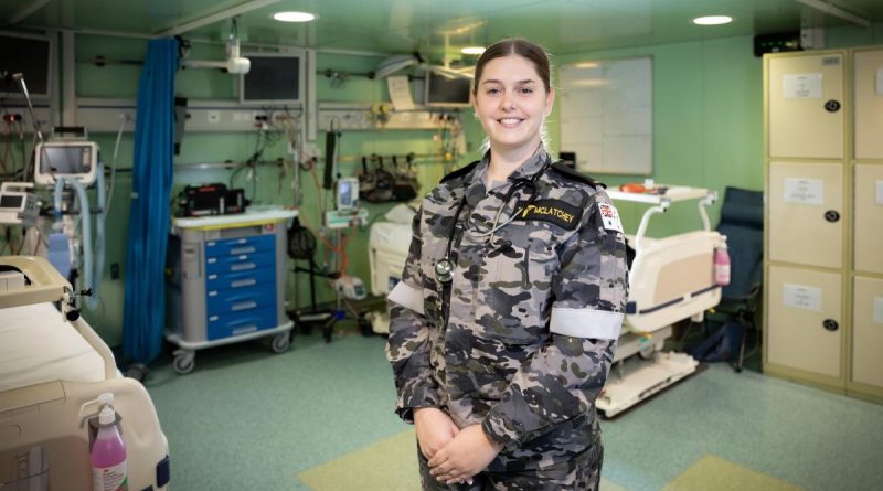 Seaman Medic Laine McLatchey stands in the sick bay onboard HMAS Canberra while at sea during Exercise Rim of the Pacific 2022. Story and photo by Leading Seaman Matthew Lyall.