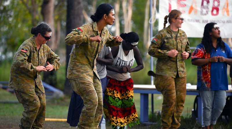 Australian Army soldiers join members of the Gapuwiyak community in performing traditional dances during the Army Aboriginal Community Assistance Program 2022 Opening Ceremony in Gapuwiyak, Northern Territory. Story by Captain Evita Ryan. Photo by Corporal Lucas Petersen.