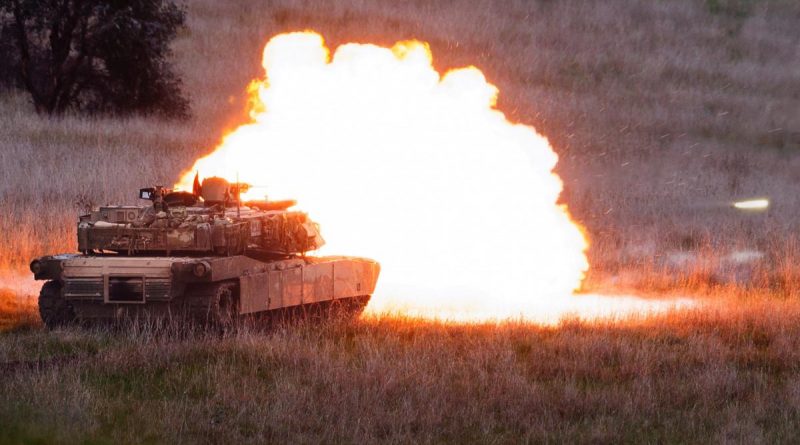 An Australian Army M1A1 Abrams main battle tank fires its main armament during Exercise Gauntlet Strike at Puckapunyal Military Training Area. Story by Captain Andrew Page. Photo by Corporal Dustin Anderson.