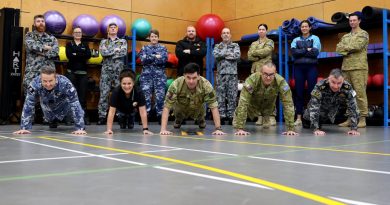 ADF personnel, Defence civilians and a member from the New Zealand Defence Force, at Head Quarters Joint Operations Command, after completing the push-up challenge. Story and photo by Sergeant Matthew Bickerton.