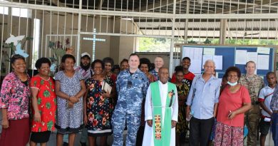 Chaplain Stuart Asquith (centre) and ADF members on Operation Kimba join Parish Priest Father Philip Jiregari and parishioners at a Sunday service at Saint Martin's Anglican Church, East Boroko Papua New Guinea. Story and photo by Major Martin Hadley.