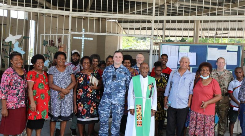 Chaplain Stuart Asquith (centre) and ADF members on Operation Kimba join Parish Priest Father Philip Jiregari and parishioners at a Sunday service at Saint Martin's Anglican Church, East Boroko Papua New Guinea. Story and photo by Major Martin Hadley.