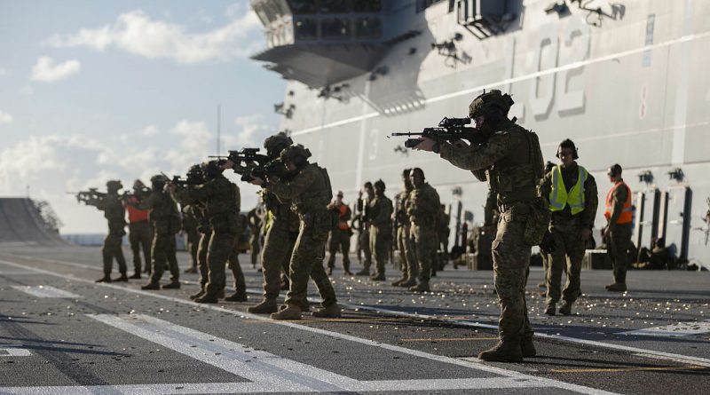 Soldiers from the 1st Battalion, Royal Australian Regiment during a live fire shoot on board HMAS Canberra in the lead up to Excercise Rim of the Pacific 2022. Story by Flying Officer Lily Lancaster. Photo by Corporal John Solomon.