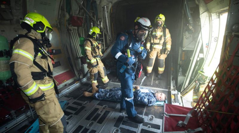 Air Force firefighters during the airfield emergency plan rehearsal at RAAF Base Richmond. Story by Flight Lieutenant Dean Squire. Photo by Sergeant Greg O'Neill.