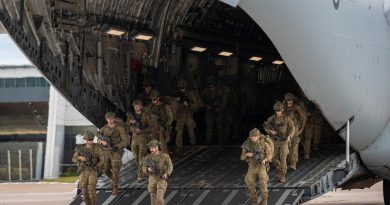 Army riflemen from Bravo Company of the 8th/9th Battalion, The Royal Australian Regiment, dismount a Royal Australian Air Force C-17A Globemaster after arriving at Toowoomba Airport. Story and photo by Corporal Nicole Dorrett.