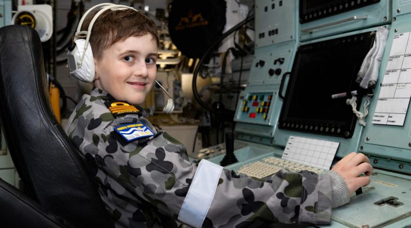 Ben operates a console in the operations room of Collins-class submarine HMAS Farncomb berthed at Fleet Base East in Sydney. Story by Lieutenant Max Logan. Photo by Able Seaman Susan Mossop.