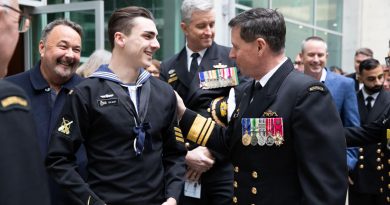 Navy Cadet Chief Petty Officer Rory Jacket, left, congratulates Vice Admiral Mark Hammond after the Chief of Navy Change of Command Ceremony at Russell Offices, Canberra. Photo by Lieutenant Carolyn Martin and Lieutenant Brendan Trembath.