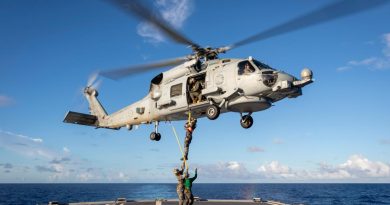 A Royal Australian Navy MH-60R Seahawk helicopter winches Commanding Officer HMAS Parramatta Commander David Murphy onto the flight deck during their regional presence deployment. Story by Lieutenant Carolyn Martin and Lieutenant Commander Andrew Herring. Photo by Leading Seaman Leo Baumgartner.