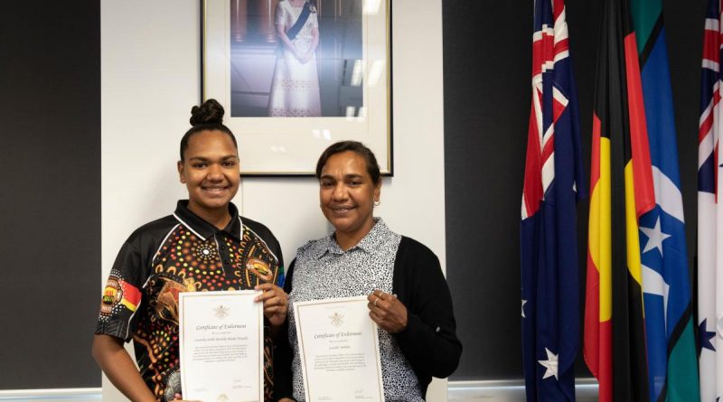 Mother and daughter duo, Scartisha Ningella, left, and Lucielle Jimbidie, at the Pilbara Regiment enlistment ceremony at Defence Force Recruiting in Perth. Story by Peta Magorian. Photo by Corporal Nakia Chapman.