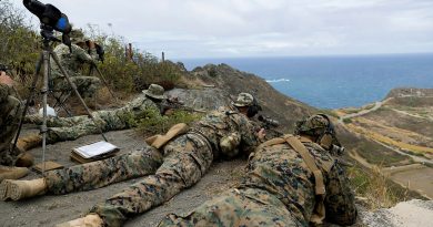Snipers from the United States Marine Corps and Mexican Naval Infantry Corps aim at Marathon Targets during a sniper live fire exercise on Exercise RIMPAC 2022. Story by Flying Officer Lily Lancaster. Photo by Corporal John Solomon.