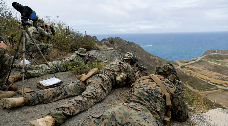 Snipers from the United States Marine Corps and Mexican Naval Infantry Corps aim at Marathon Targets during a sniper live fire exercise on Exercise RIMPAC 2022. Story by Flying Officer Lily Lancaster. Photo by Corporal John Solomon.